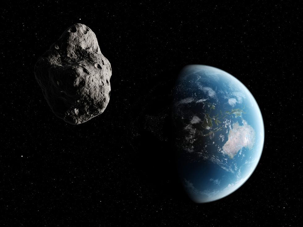 Stock image of asteroid and earth