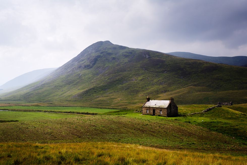 stock image of house in the ottish highlands / Bob Dylan