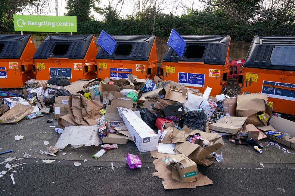 Stock - Overfilled recycling bins in Birmingham