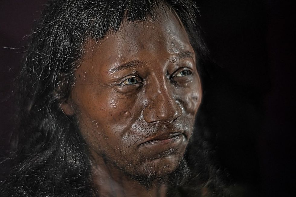 t Cheddar Man, who lived 10,000 years ago in Britain, had dark skin and blue eyes.u200b