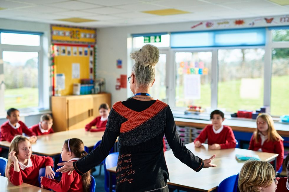 Teacher standing in front of class