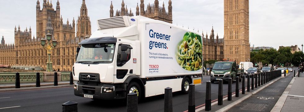 Tesco delivery van driving past Westminster