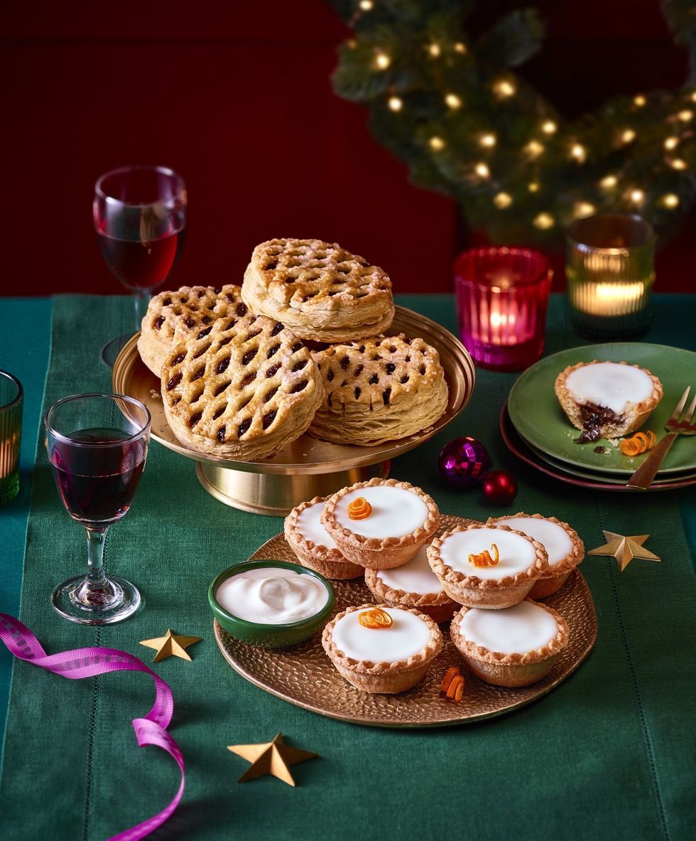 tesco shop sign and mince pies stock