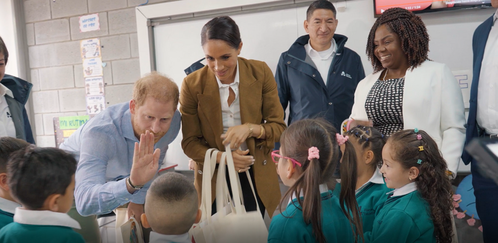 The 39-year-old also high-fived another student at La Giralda School in Bogota