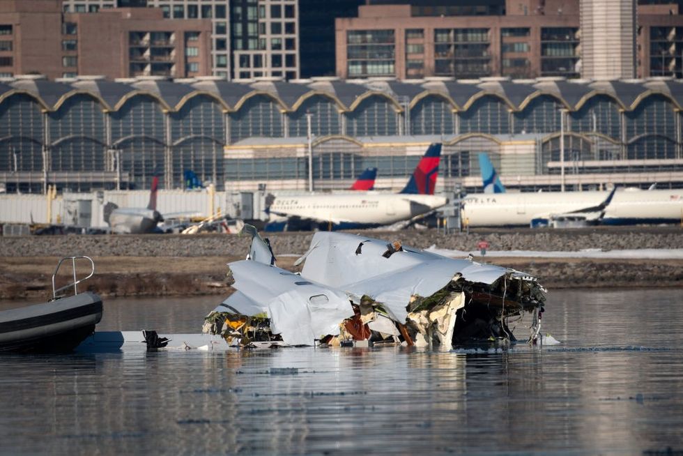 The Coast Guard investigates aircraft wreckage on the Potomac Riveru200b