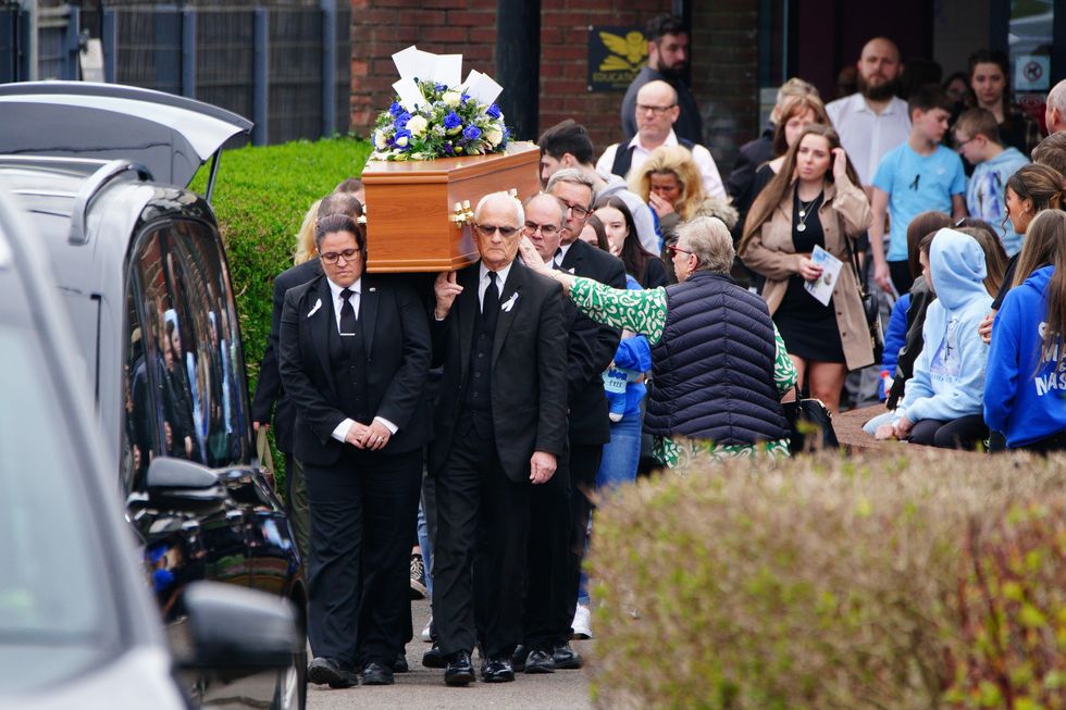 The coffin of 16-year-old Max Dixon is carried out of Imperial Sports Ground in Brislington following his funeral servicu200b