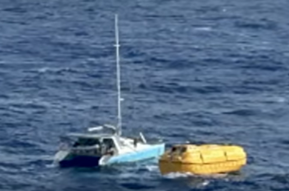 The Disney Treasure launched a small boat to rescue the family of four