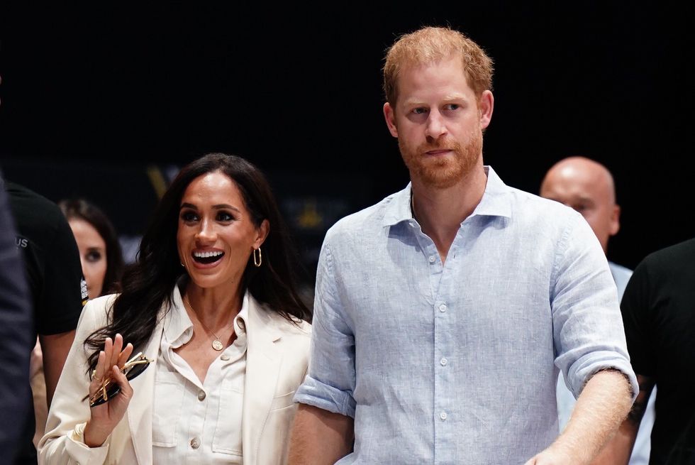 The Duke and Duchess of Sussex arrive to watch sitting volleyball at the Merkur Spiel-Arena during the Invictus Games in Dusseldorf, Germany