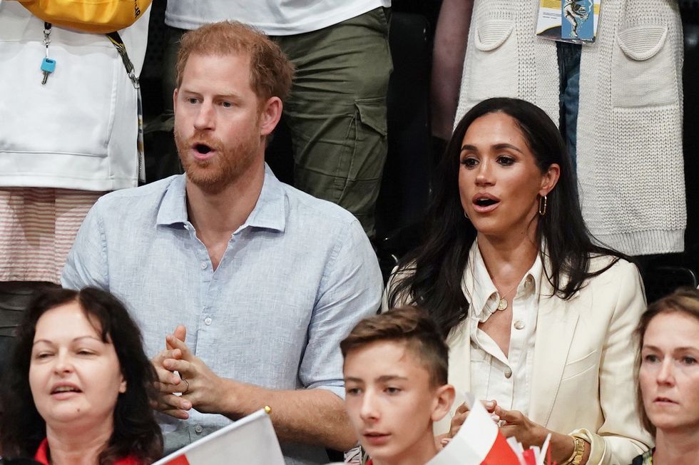 The Duke and Duchess of Sussex watch sitting volleyball at the Merkur Spiel-Arena during the Invictus Games in Dusseldorf, Germany