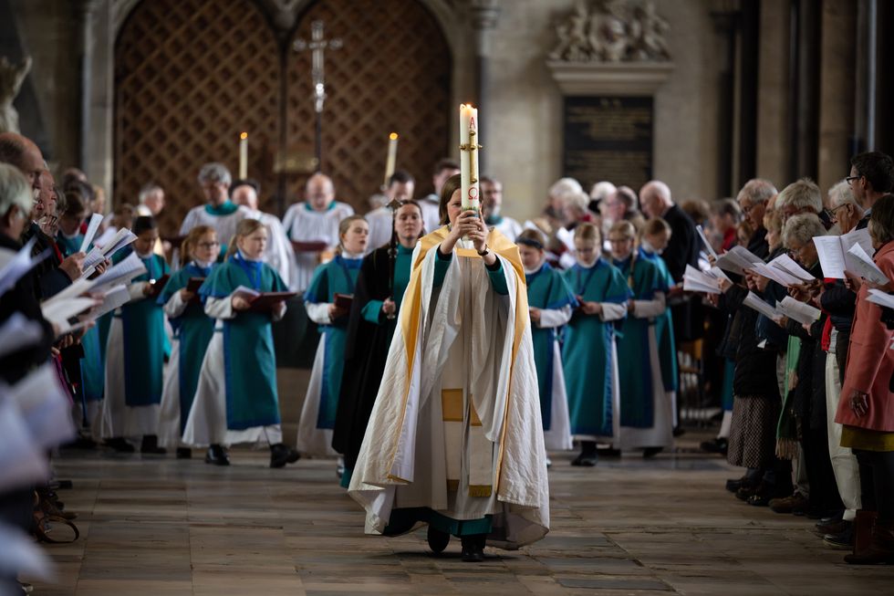 The Easter candle is processed through the Cathedral at the special service of Easter readings