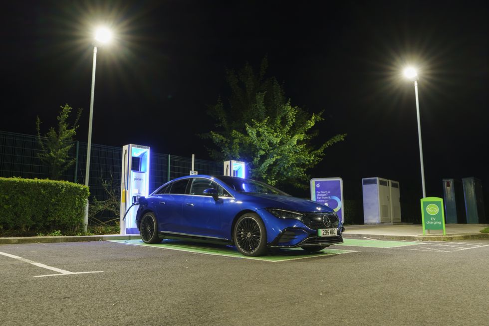 The Mercedes-Benz EQE 350+ at an EV charging station