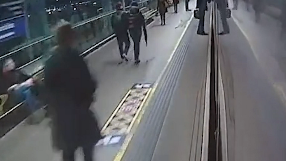 The passenger is seen getting close to the train