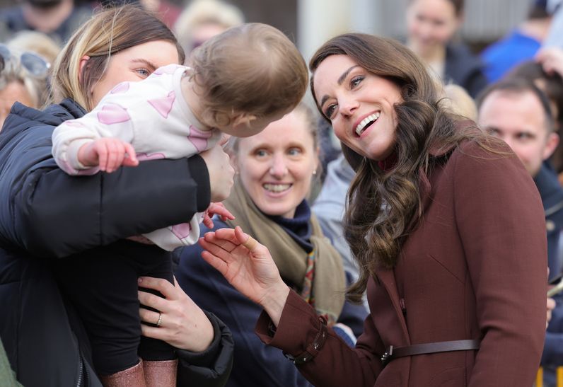 the-princess-of-wales-known-as-the-duchess-of-cornwall-while-in-cornwall-interacts-with-a-child-as-she-departs-the-national-ma.jpg?id=33096176&width=796&quality=80