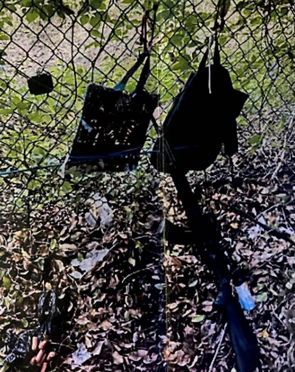 The rifle propped against a fence outside of Trump's resort