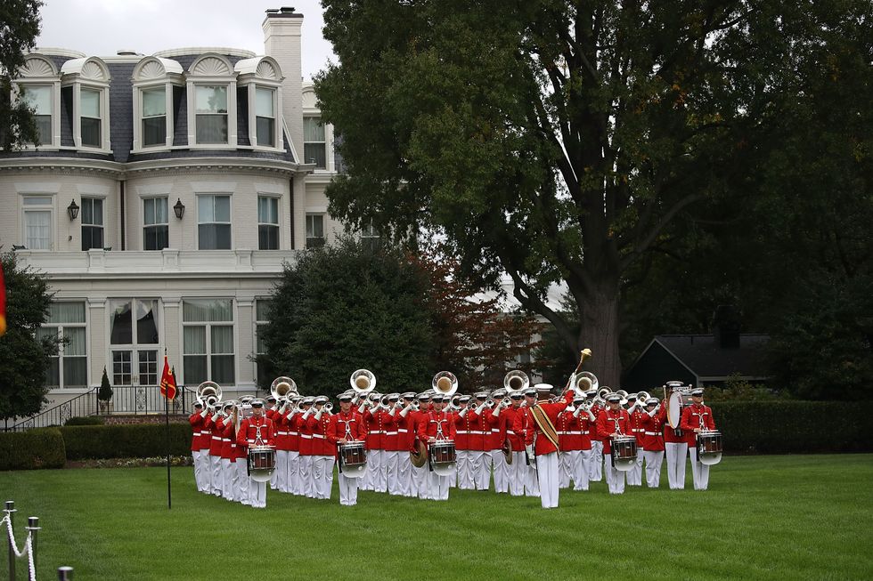 The US Marine Drum and Bugle Corp. plays during a ceremony to commemorate the anniversary of the 1983 bombing of the Marine barracks in Beirut, Lebanon, at the Marine barracks on October 23, 2017