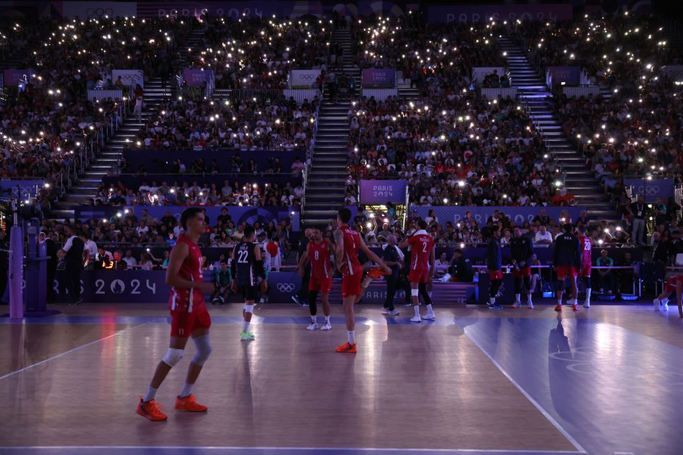 The volleyball arena was plunged into darkness momentarily