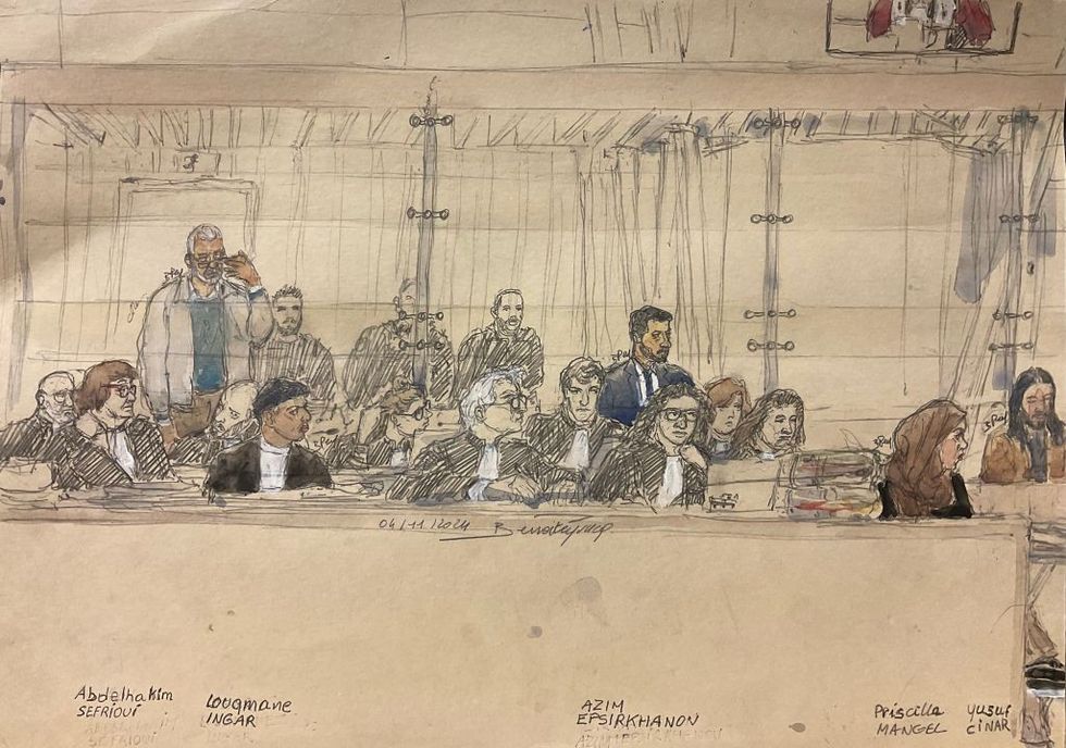 This court sketch made and published on November 4, 2024, shows (L-R) defendants Abdelhakim Sefrioui, Louqmane Ingar, Azim Epsirkhanov, Priscilla Mangel and Yusuf Cinar sitting during the trial