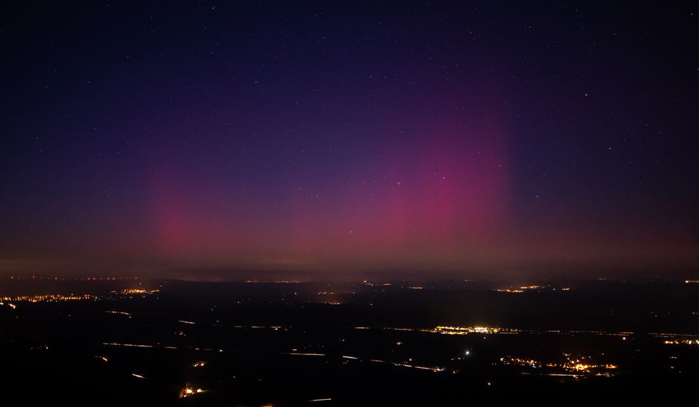 This picture taken from the southeastern France village of La Roquebrussanne shows an aurora borealis early on January 1