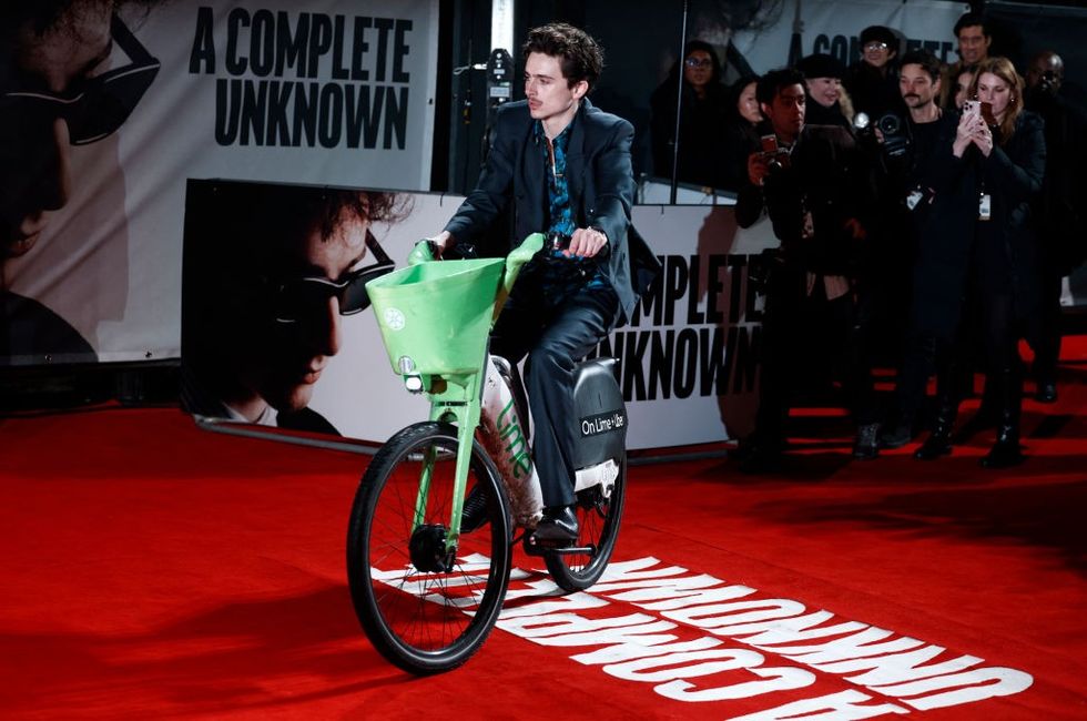 Timothee Chalamet with an e-bike at the premiere of A Complete Unknown