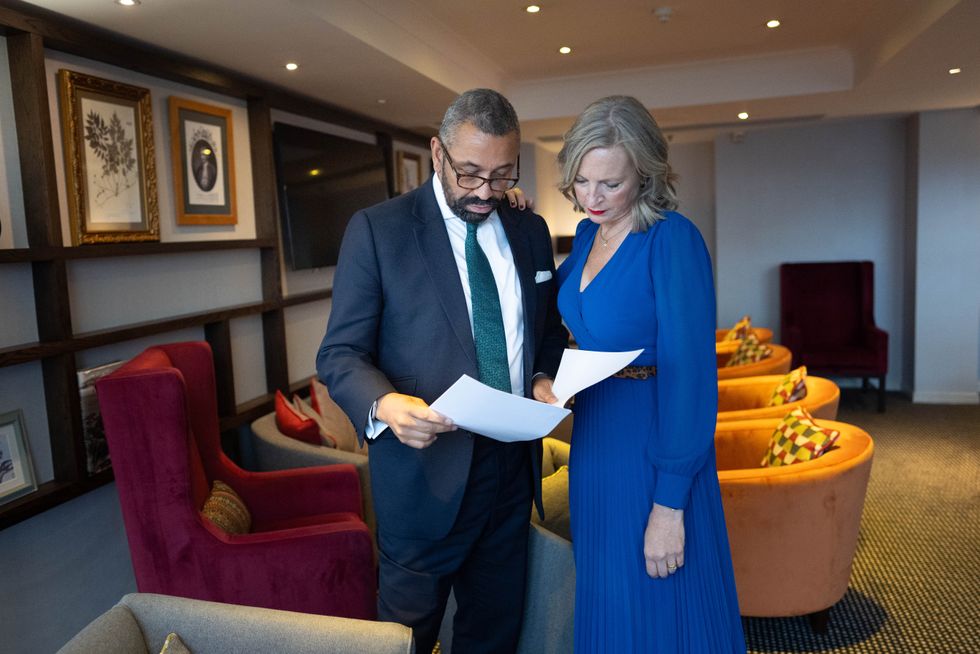 Tory leadership candidate, James Cleverly prepares his speech watched by wife Susie