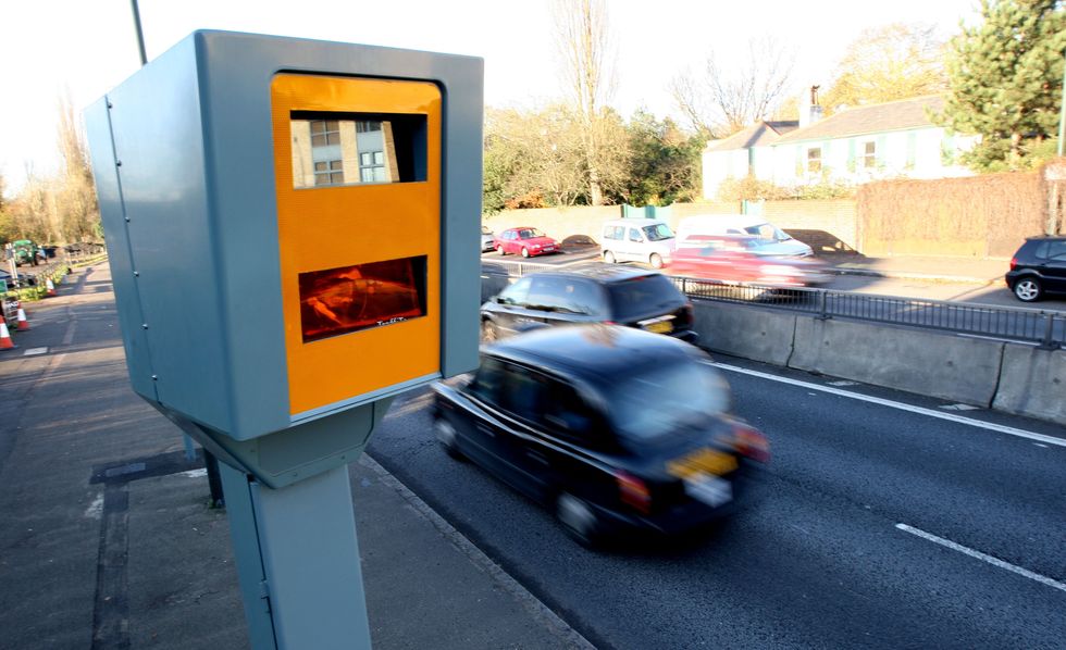 Traffic camera overlooking busy road