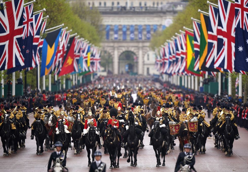 Troops with Commonwealth flags on Charles's coronation day