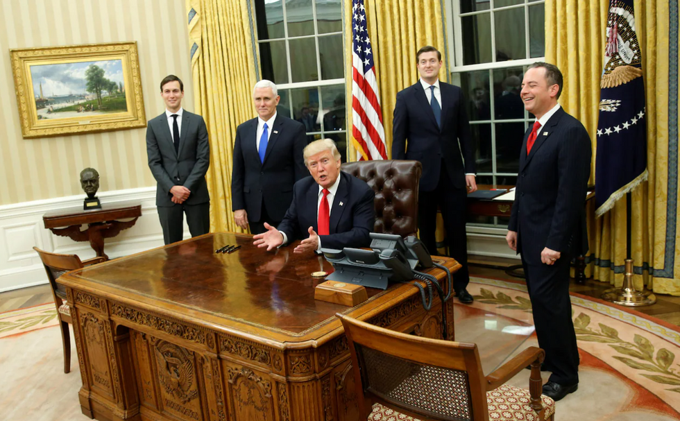 Trump in Oval Office with bust