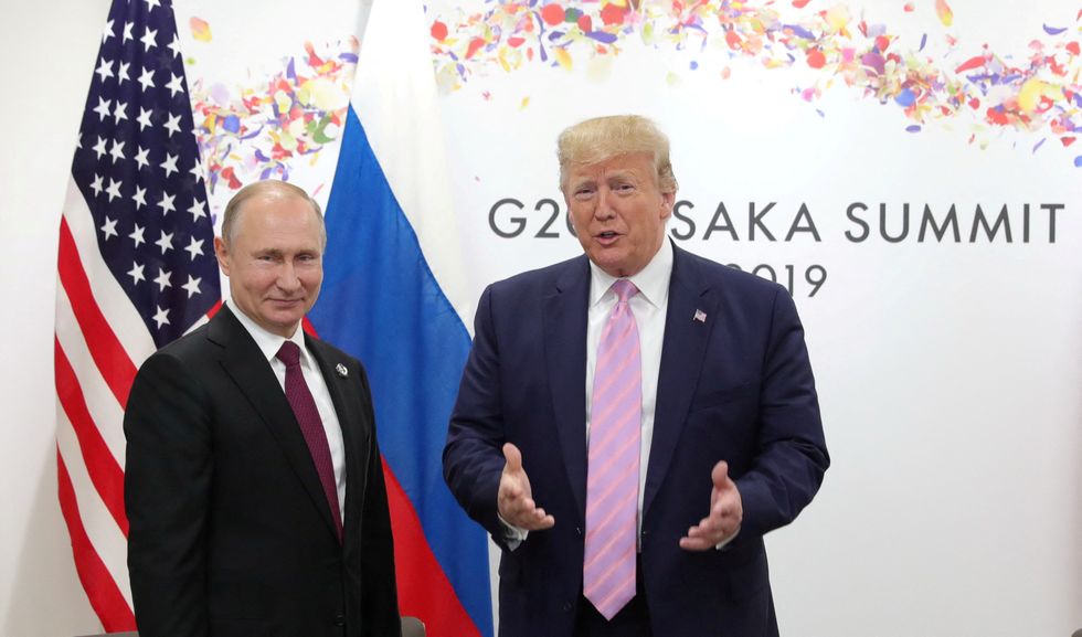 Trump with Putin in 2019