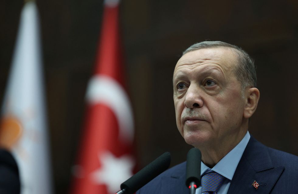 Turkish President Tayyip Erdogan addresses members of parliament from his ruling AK Party