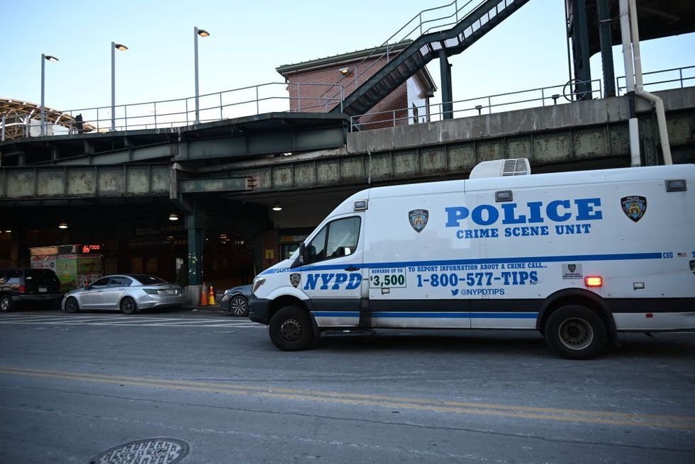 u200b Police investigates the scene where a woman died after being lit on fire by a man aboard an MTA subway train