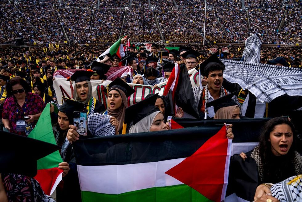 u200b Students demonstate during a Pro-Palestinian protest during the University of Michigan's spring commencement ceremony