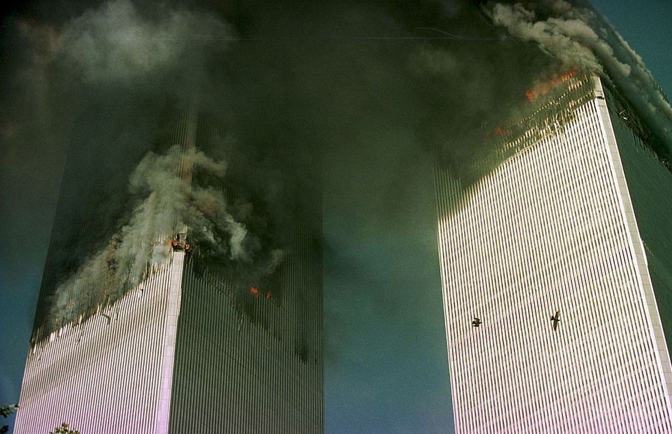 u200b The World Trade Center is engulfed in flames just before the south tower collapsed September 11, 2001 in New York City