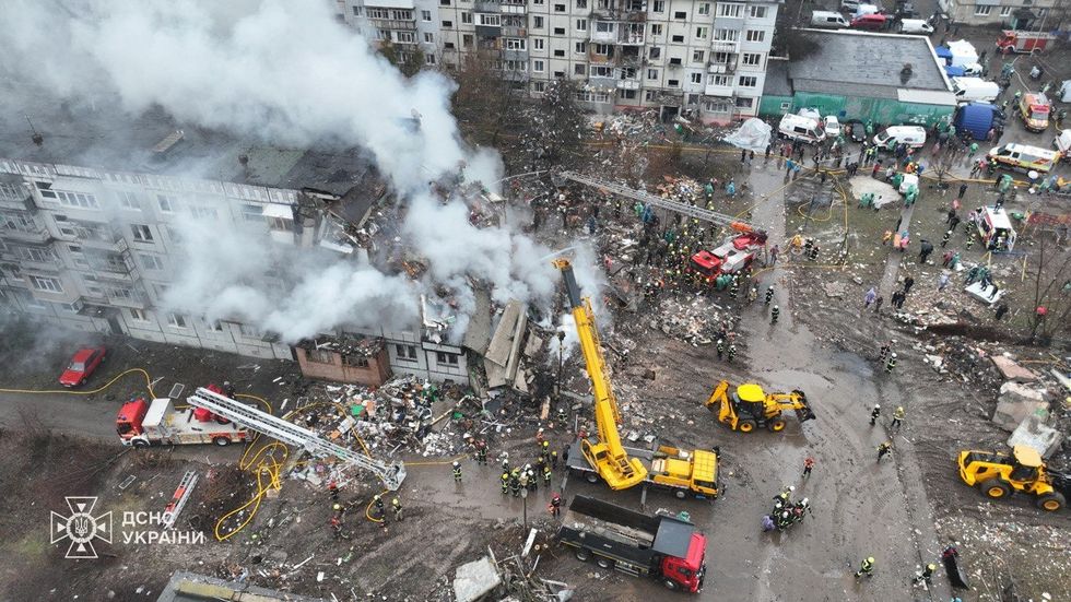 u200bA drone view shows the site of an apartment building hit by a Russian missile strike, amid Russia's attack on Ukraine, in Poltava