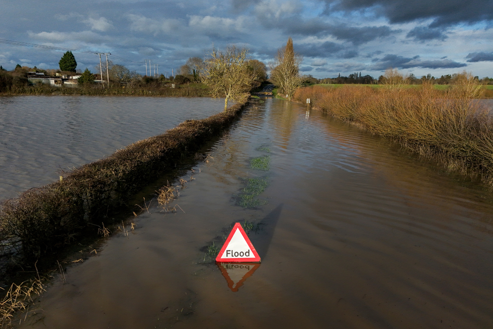 u200bA flooded Eckington Road in Defford, Worcestershire