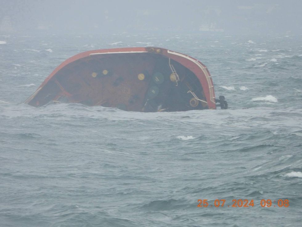 \u200bA handout photo released by the Philippine Coast Guard shows the tip of MT Terra Nova protruding in Manila Bay, Philippines