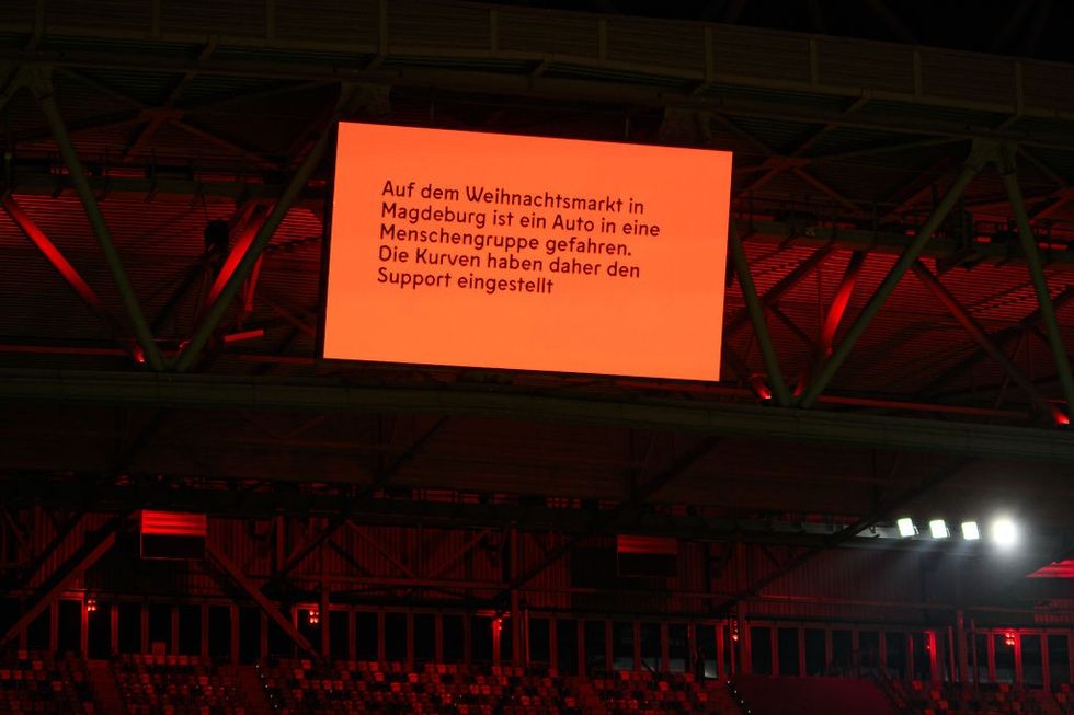 \u200bA message on the wall at the match between Dusseldorf and Mageburg