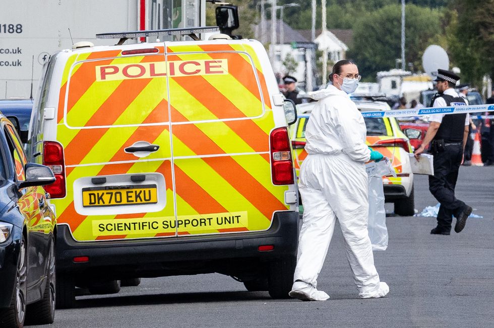 u200bA police scenes-of-crime officer (SOCO) at the scene in Southport, Merseyside