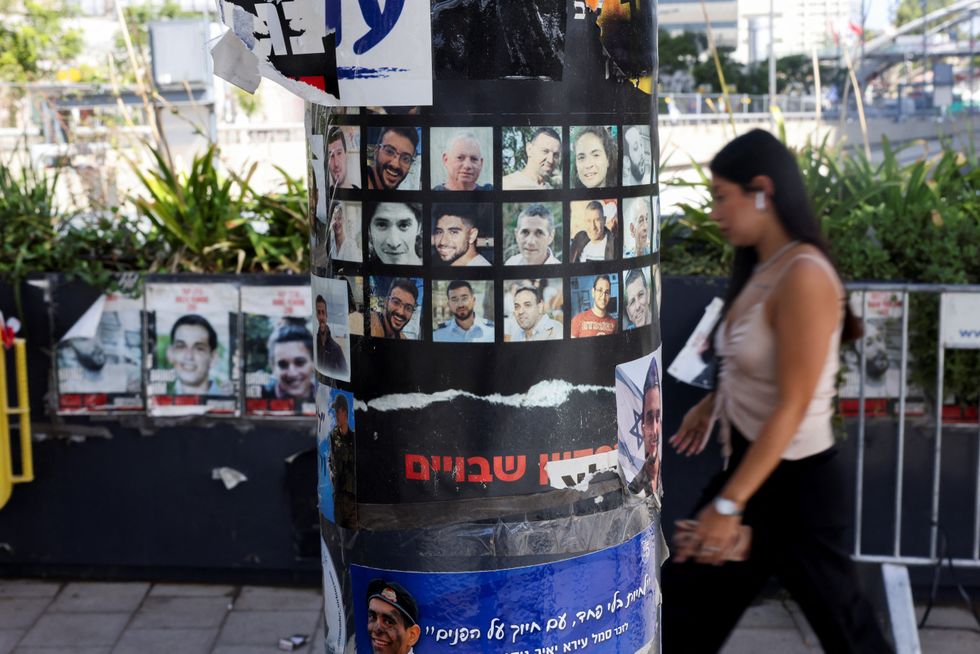 \u200bA poster featuring who were taken hostage or killed during the October 7 attack