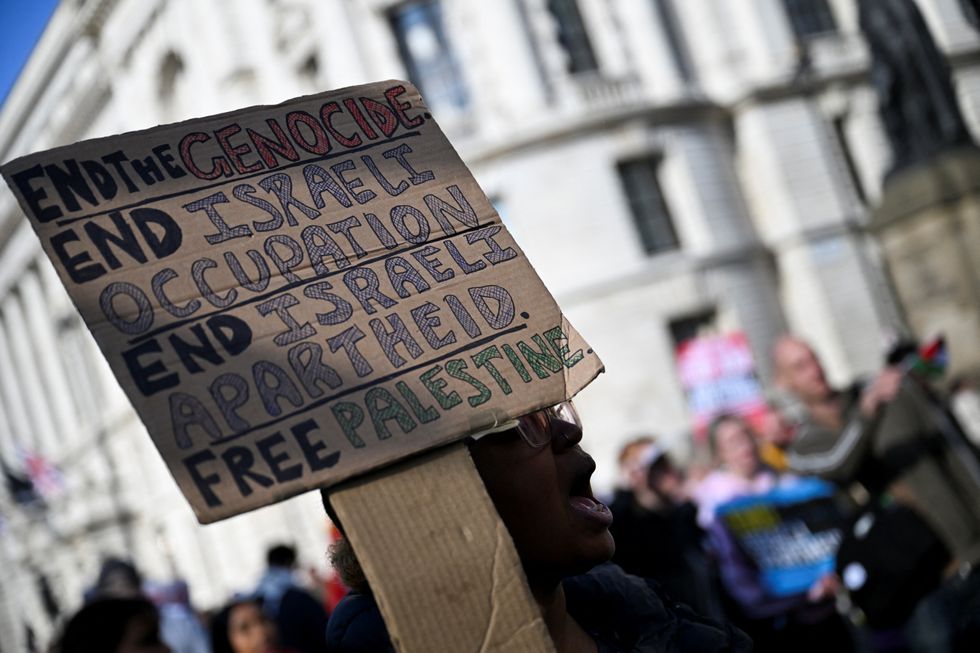 u200bA protester holds a placard during a demonstration in support of Palestinians in Gaza, ahead of the October 7 attack anniversary