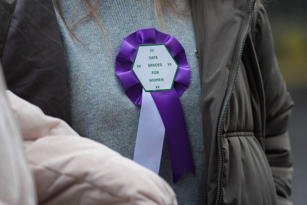 \u200bA rosette worn by a supporter of Sandie Peggie, a nurse at Queen Margaret Hospital in Dunfermline