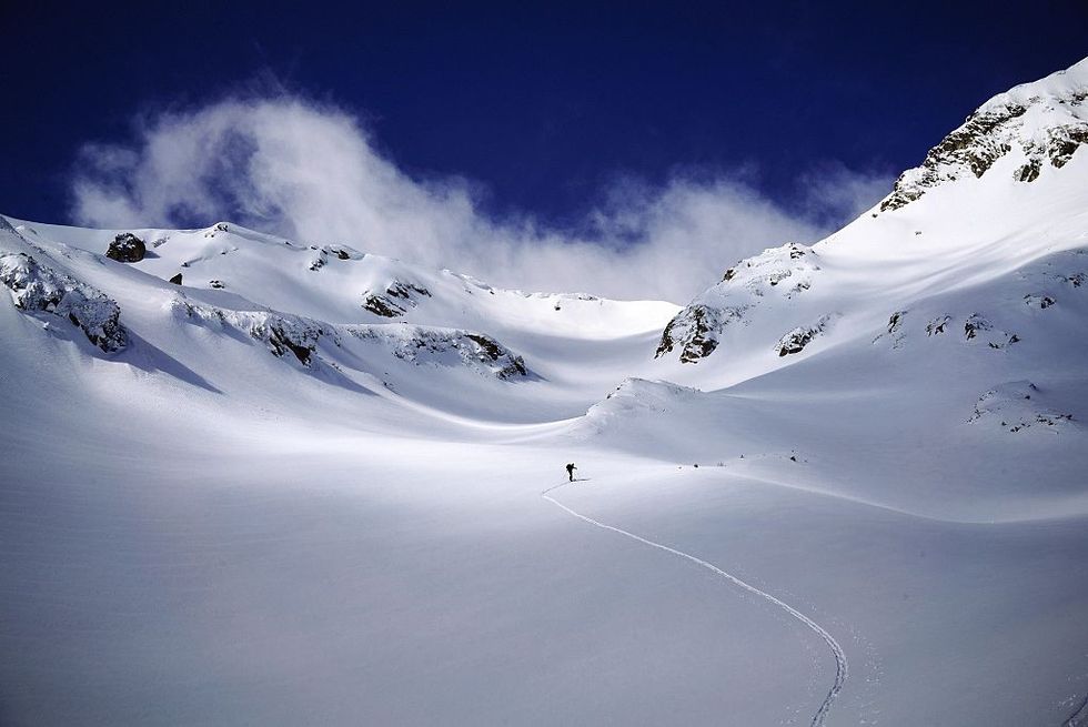 u200bA skier enjoys the slopes of the Pirin Mountains