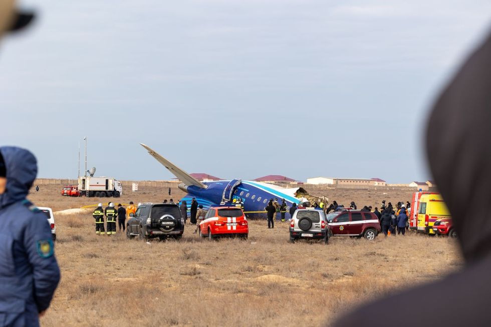 u200bA view of the scene after an Azerbaijan Airlines flight with 67 people on board, traveling from the Azerbaijani capital Baku to Grozny in Russia's Chechnya region, crashed near the Kazakh Caspian city of Aktau