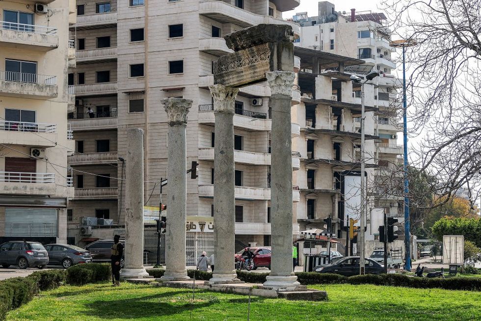 \u200bAncient Roman columns stand in a park in Syria's western city of Latakia