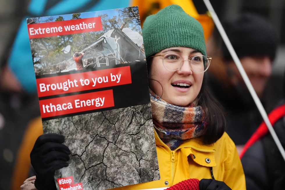 u200bClimate activists from Greenpeace and Uplift during a demonstration outside the Scottish Court of Session, Edinburgh