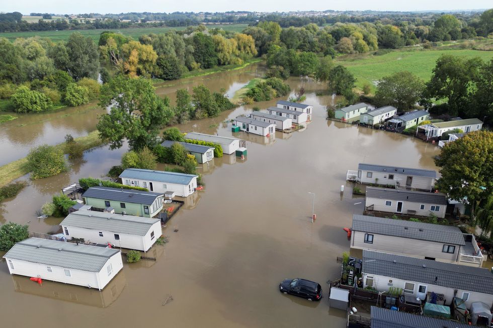 u200bCogenhoe Mill Holiday Park in Northamptonshire submerged by floodwater after the River Nene burst its banks