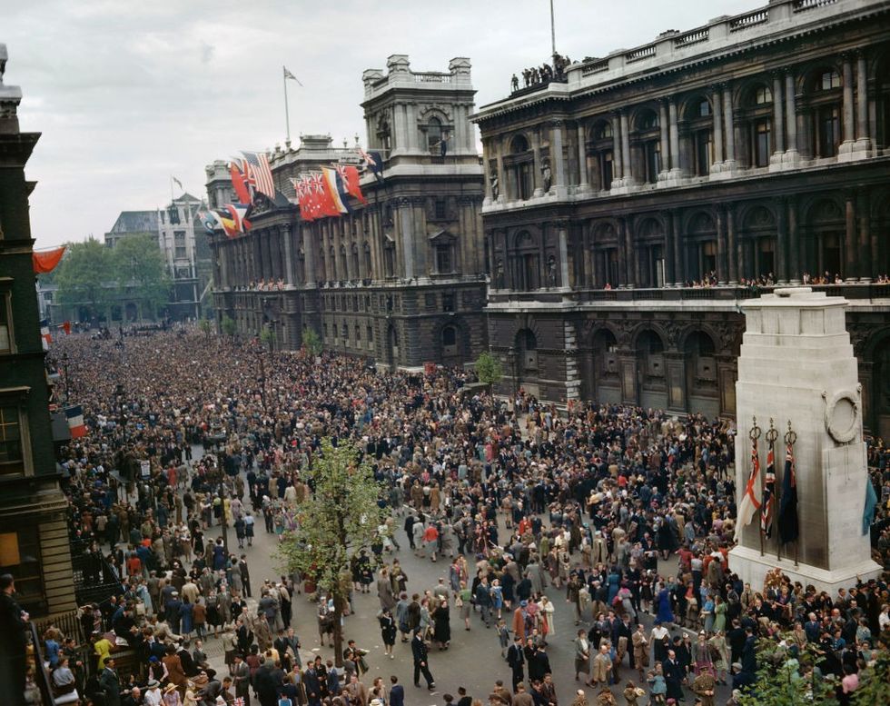 \u200bCrowds surround the Cenotaph and Ministry of Health building at Whitehall, May 8 1945