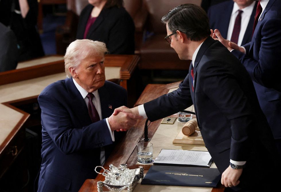 u200bDonald Trump shook  hands with Speaker of the House Mike Johnson and JD Vance following his address