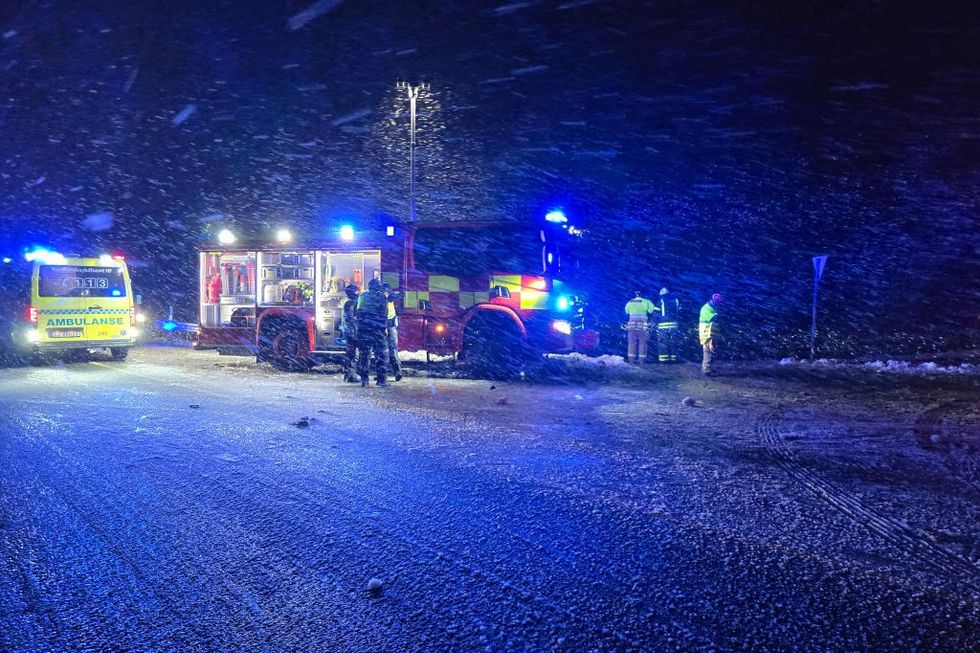 u200bEmergency Services attend near the scene of an overturned bus after it left the road in an accident which killed three people, near Hadsel