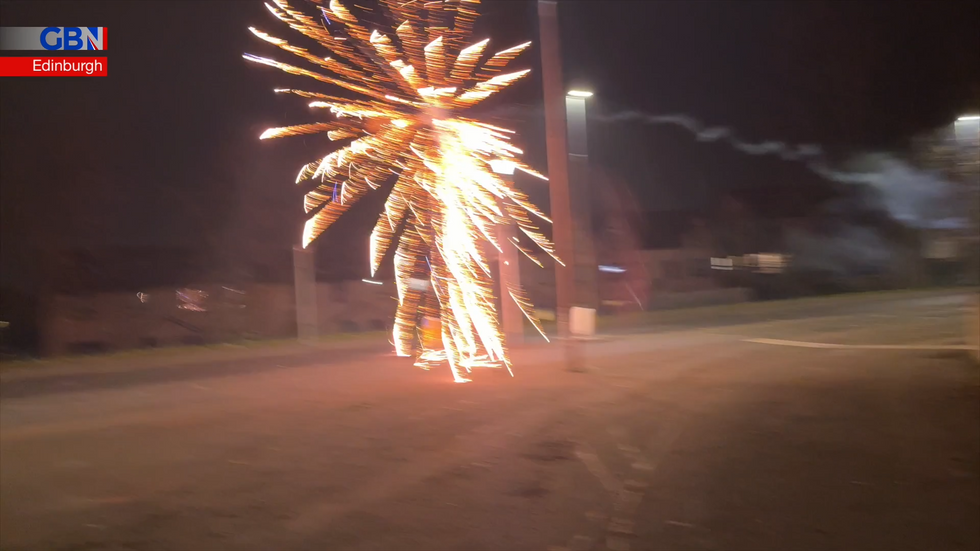 u200bFirework explodes on street