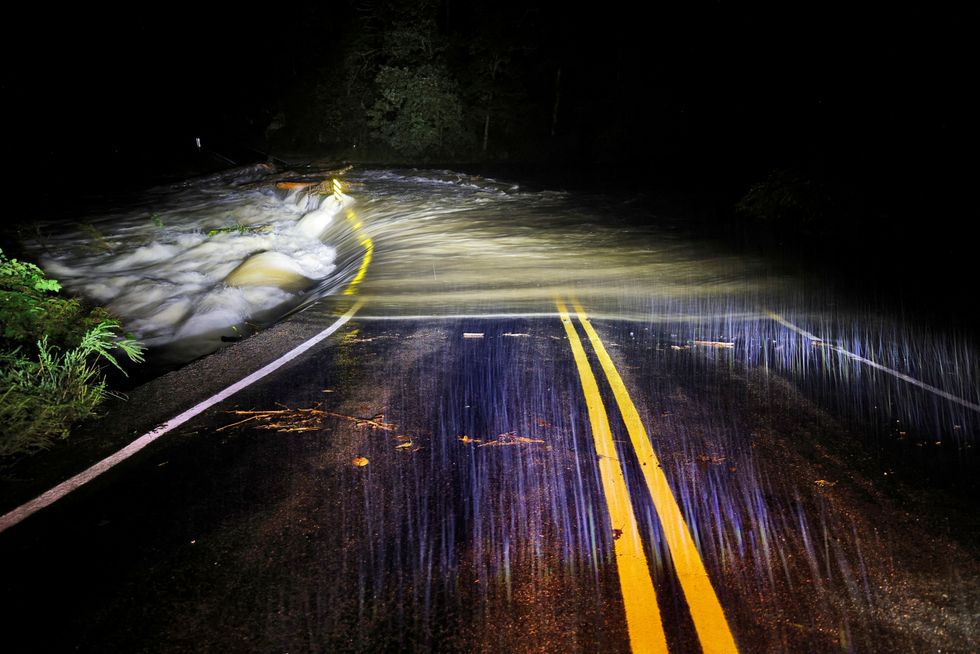 u200bFlood waters wash over Guy Ford Road bridge on the Watauga River as Hurricane Helene approaches in the North Carolina mountains, in Sugar Grove, North Carolina